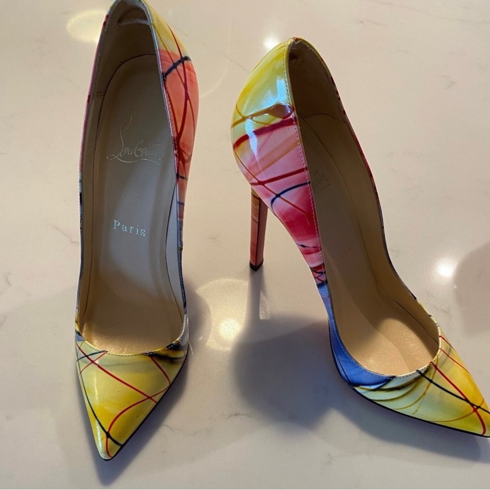 Christian Louboutin- Red Bottoms - 35.5 - one of a kind. Amazing condition.
